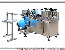 Disposable plastlc shoe cover making machine